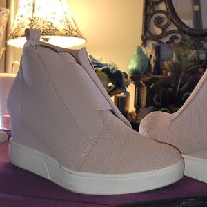 Pink slip on ankle boots